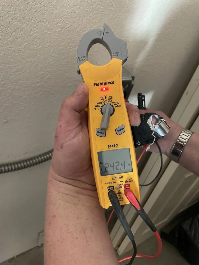 Voltage testing with clamp meter during Hot Tub / Pool Electrical Wiring in Lamar